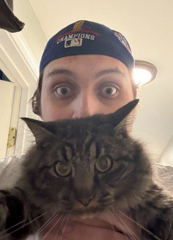 daniel holding a cat